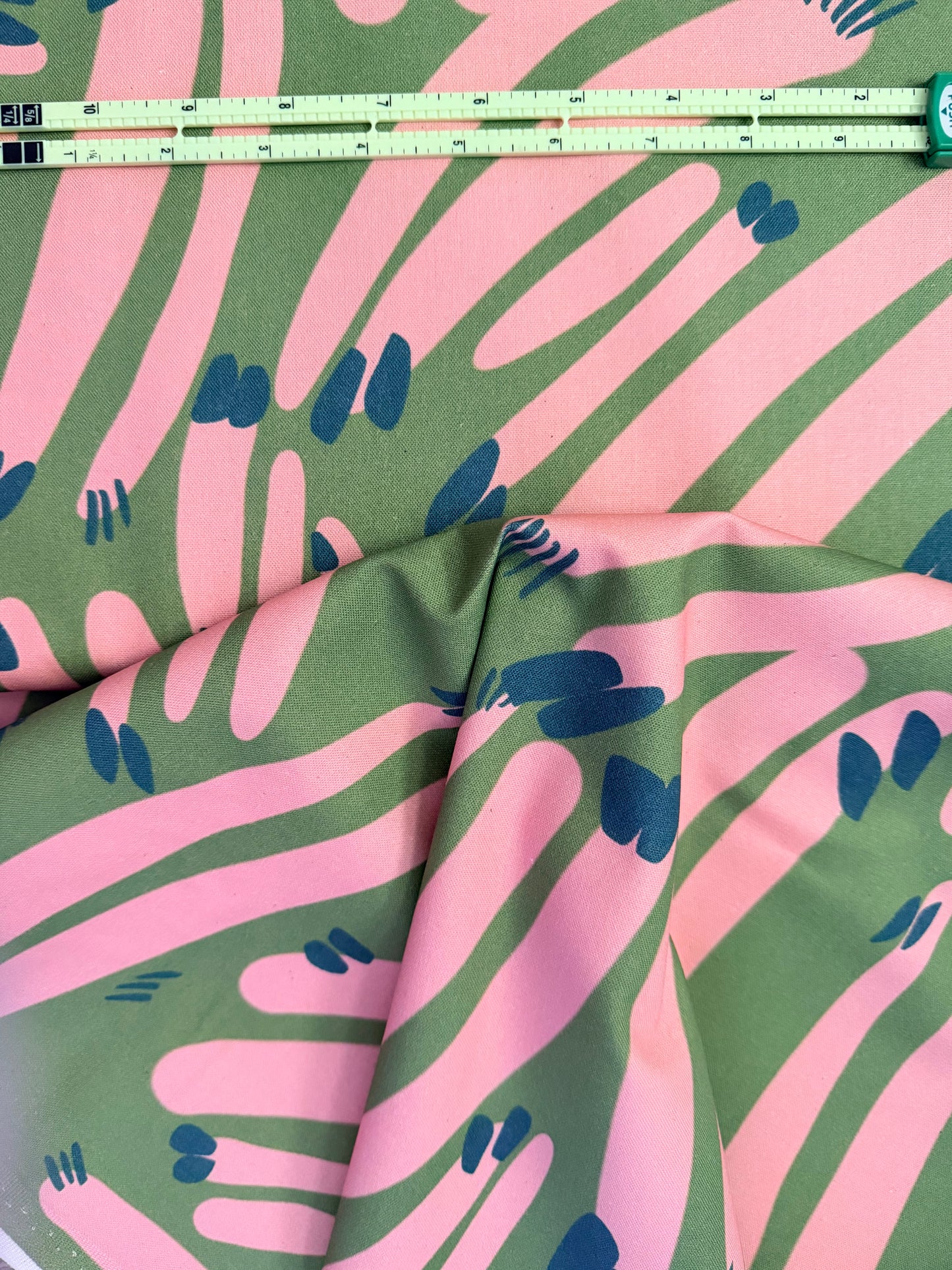 Cotton Canvas - Green/peach claws and dashes